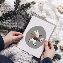 Enkelt kort med kuvert -  Skridskoåkande kanin (Fraktfritt)