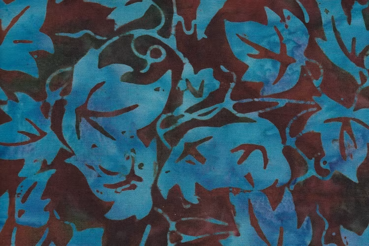 Grönbrun med turkost tryck