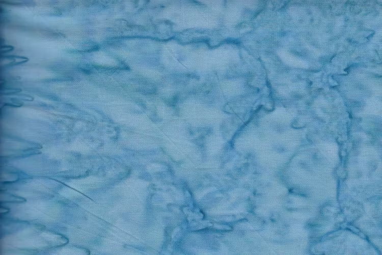 Ljus blåturkos. Melerat bomullstyg