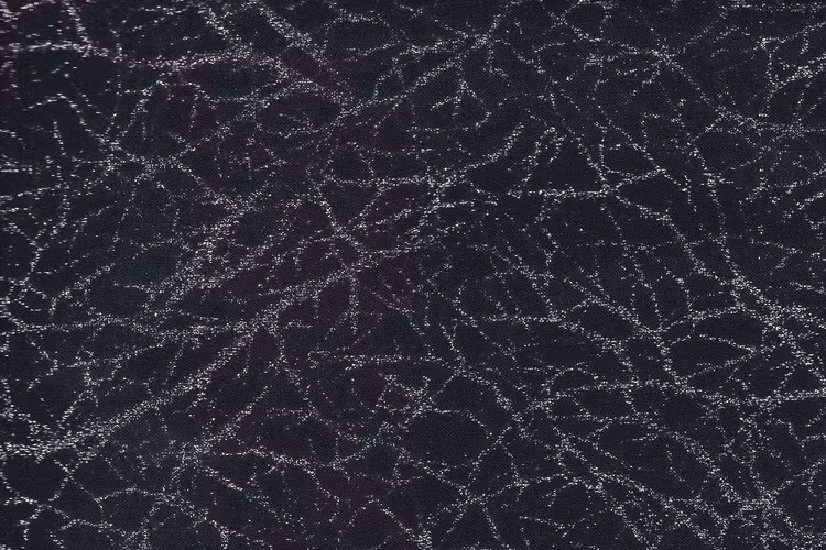 Svart med silverflakes, bomull, 110 cm bred