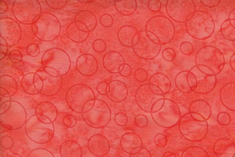 Orange med cirkel-tryck, ej batiktryckt