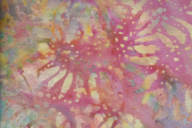 Flera vackra färger med solrostryck. Extrabred bomullsbatik direkt från Bali