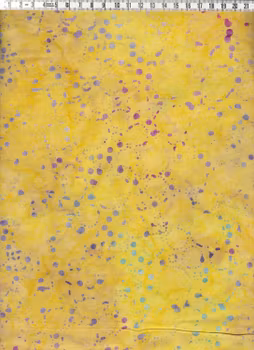 Gul och lite beige botten med flerfärgat mönster vikosbatik 140 cm