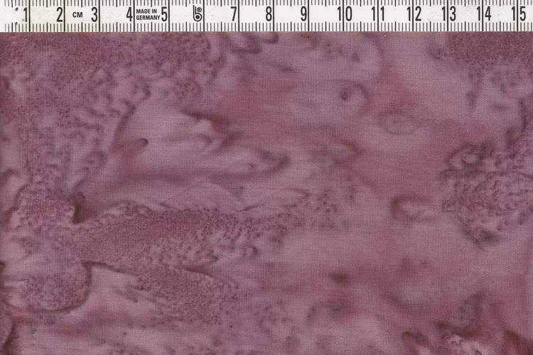 Auberginefärgat melerat. Bredd 110 cm
