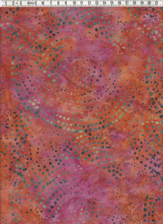 Röda och cerise färger med prickar. Balibatik i bomull