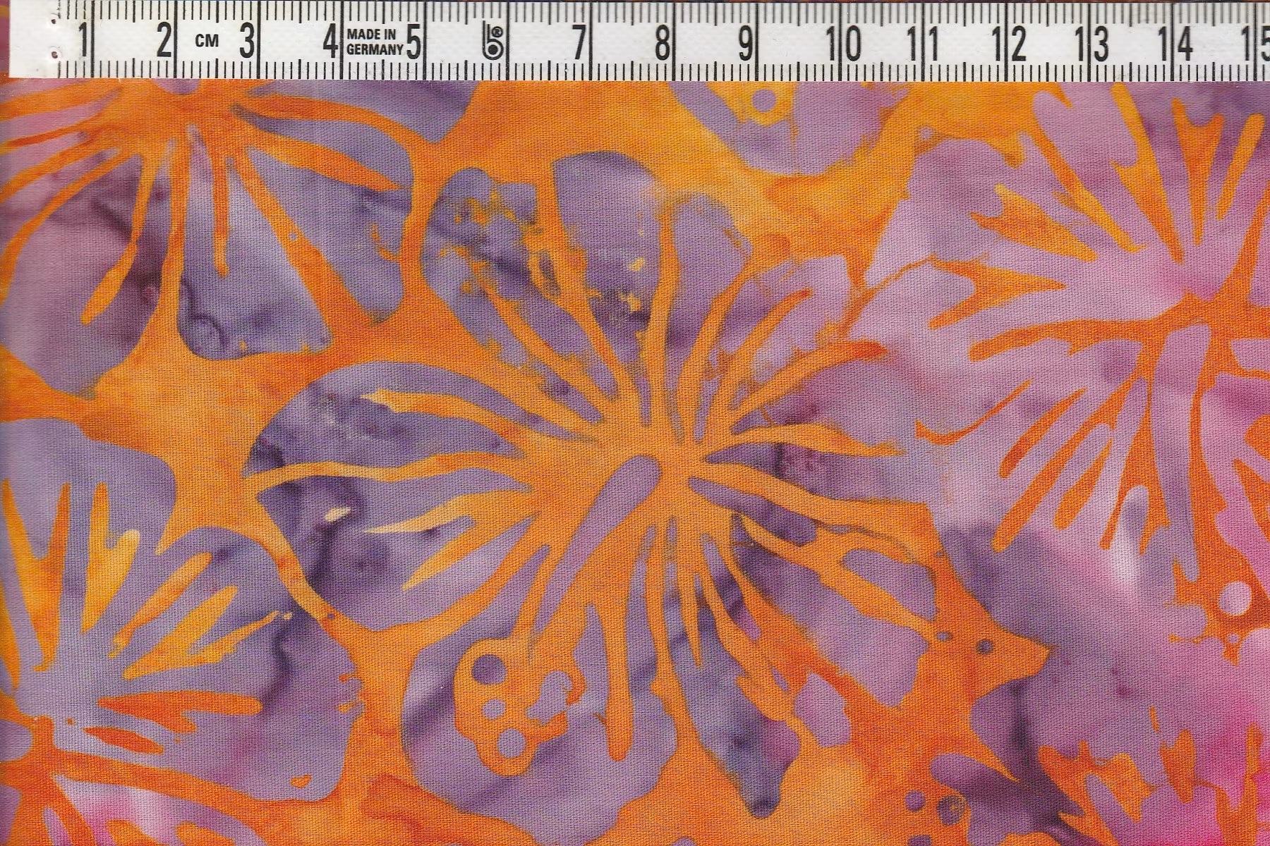 Orangemelerat med orkideér i cerise och lila Bomull 110 cm