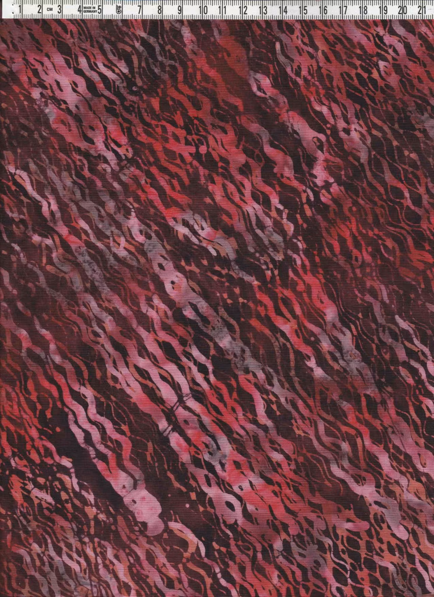 Diagonalmönstrat med mäktiga röda, rosa och svarta färger