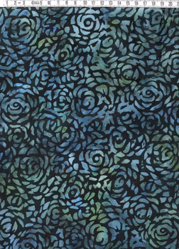 Svart trikåtyg med enkelt mönster i blått och lite grönt. Bredd 140 cm.