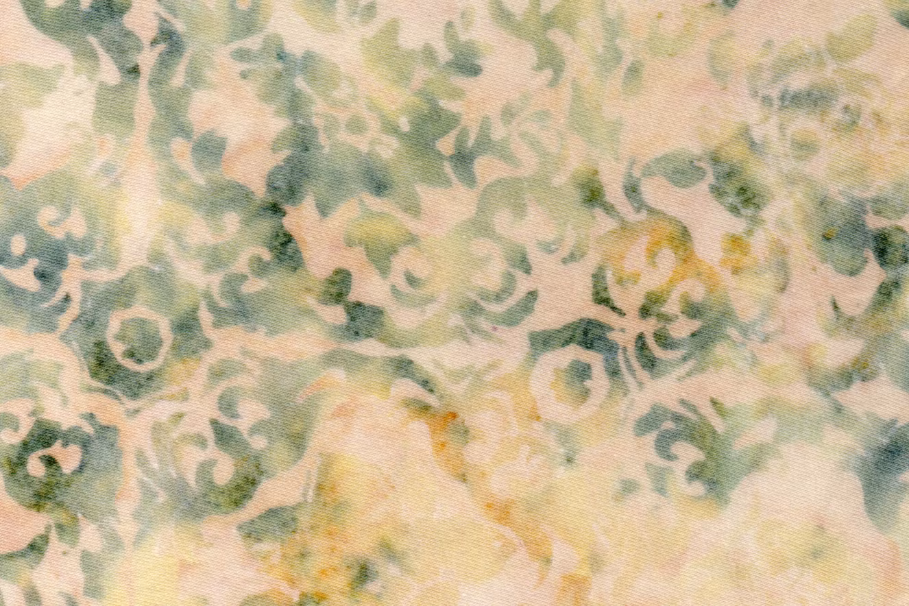 Ljusbeige med bleka gröna färger. Batik trikå från Bali. Ca 120 cm brett