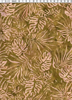 Brungrönflammigt tyg med monsterablad. Batik bomull