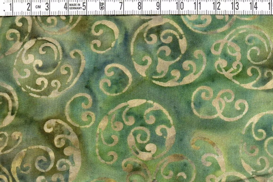 Grönt tyg med gammaldags pondus. Trikå 100% bomull. Bredd 140 cm