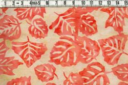 Aprikos & ljusgul-beige med snygga löv.  Batik bomull 110 cm
