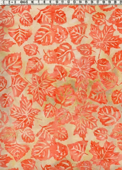 Aprikos & ljusgul-beige med snygga löv.  Batik bomull 110 cm
