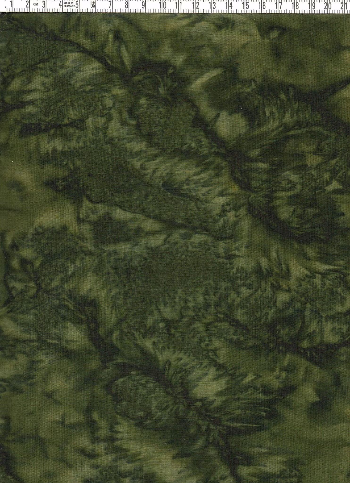 Melerad. Mörk mustig grön. Bomull. Bredd 110 cm