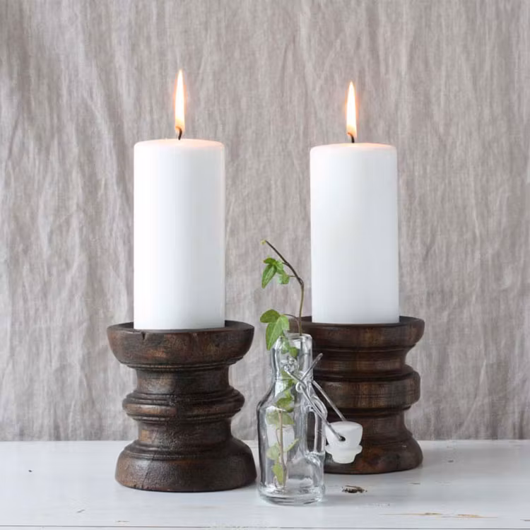 Återbrukade träljusstakar