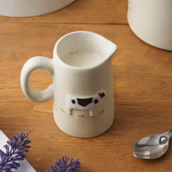 Liten kanna för mjölk eller grädde Ko