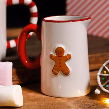 Liten kanna för mjölk eller grädde Pepparkaksgubbe