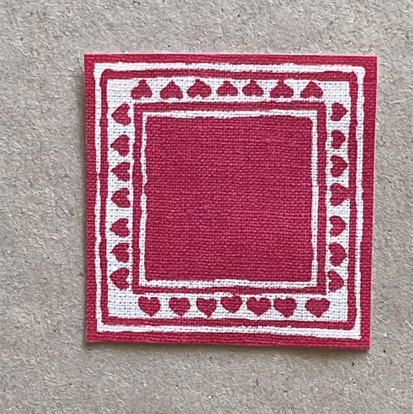 Liten röd duk ca 40 x 40 mm