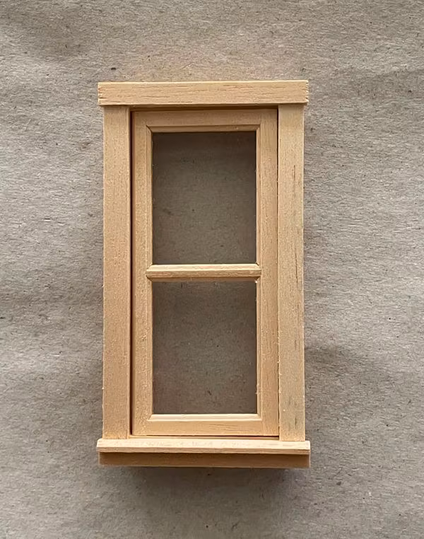 Fönster omålat ca 50x93 mm