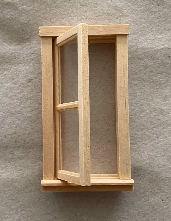 Fönster omålat ca 50x93 mm
