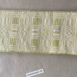 Broderad matta