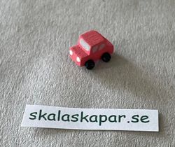 Ljusröd liten bil