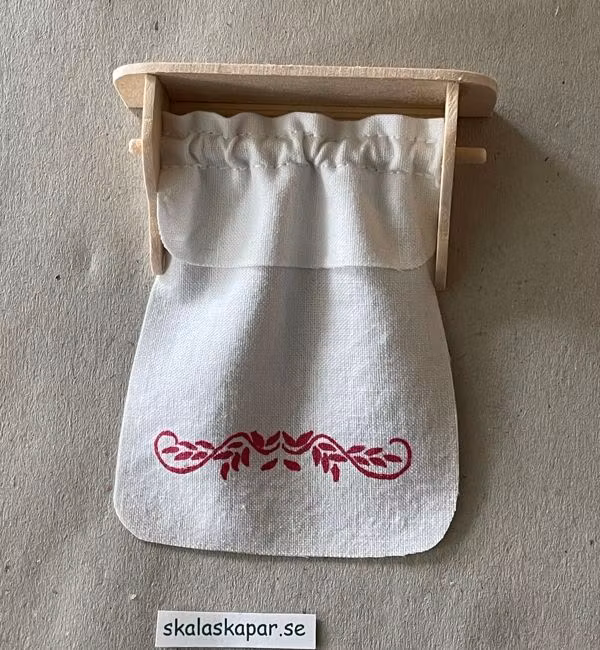 Paradhanddukshylla, rött tryck