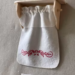 Paradhanddukshylla, rött tryck