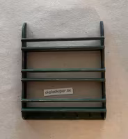 Tallrikshylla, mörkgrön med knoppar