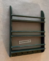 Tallrikshylla, mörkgrön med knoppar