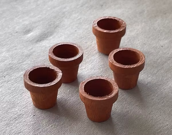 Blomkrukor i trä, 5 st