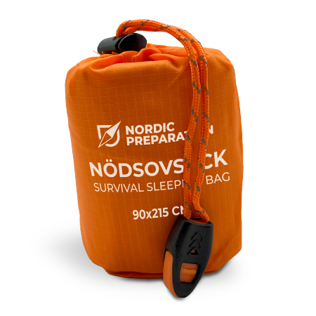 Nödsovsäck med nödvisselpipa