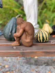 Figurin man i polystone