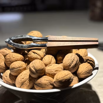 Nötknäppare - silverfärgad och teakskaft vintage