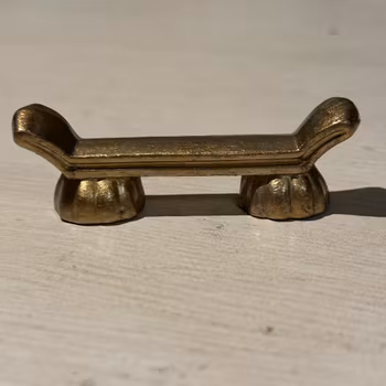 Smörtax i tyngre metall i guld vintage