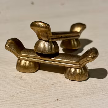 Smörtax i tyngre metall i guld vintage