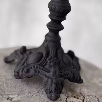 Ljusstake hög i svart gjutjärn Regency
