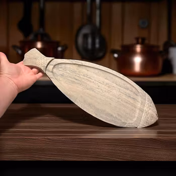Fat uppläggningsfat formad som en fisk, sten, vintage
