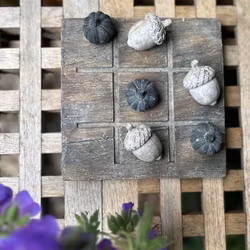 Spel tre i rad i praktisk komposit, vitlök/ekollon, Eldgarden