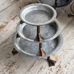 Fat Kalle Anka i zink och tre fötter i guld - Eldgarden