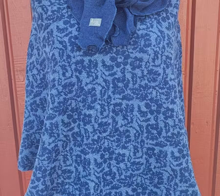 Poncho-blomsteräng blå