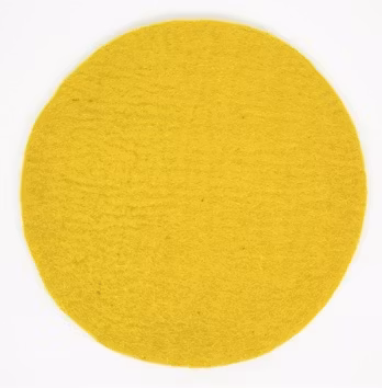 Sittdyna Felt Solo, härligt varmgul färg, diameter 38 cm. Handtovad i Nepal för Afroart.