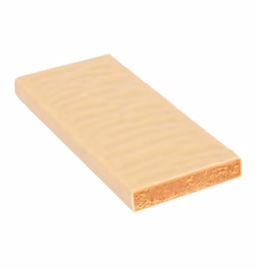 Zotter For Sweet Bunnies är en exklusiv påskchokladkaka eller stor chokladpralin med vitchoklad, fylld med honungskaramellkrisp. Här utan omslagspapper. Fair Trade.