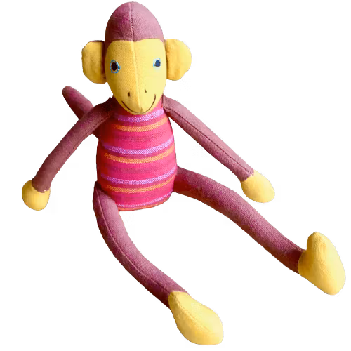 Sittande apa i tyg, tygleksak och maskot. Grön-blå rutig. Armar och ben i fin brun färg. Klargula händer, fötter, öron, ansikte. Pigg & charmig. Fair Trade.