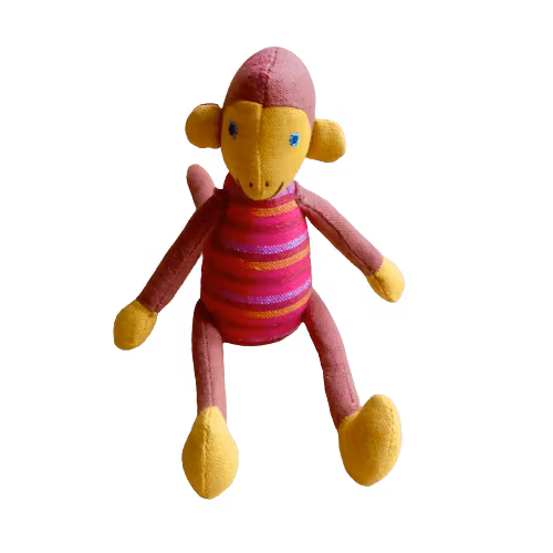 Sittande apa i tyg, brun med randig kropp. Ansikte, öron, händer och fötter i klargul. Sött & vänligt ansikte. Charmig som maskot!