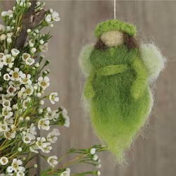 Liten god fe, ängel, maskot, tovad, grön