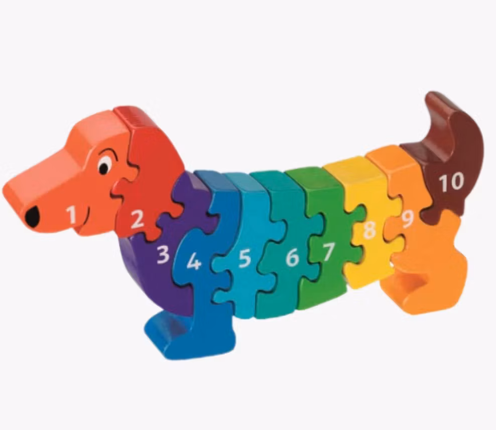 Färgglad räknepussel i tio delar, Tax, hund, siffror 1-10, trä. Fair Trade.