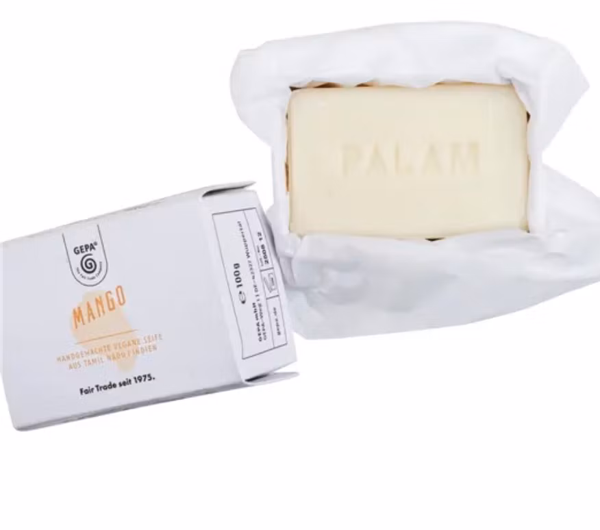 Mangodoftande tvål från Indien. Fair Trade. Bild med förpackning och utan förpackning. Dekoration.
