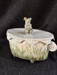 Musen Klas på burk med lock