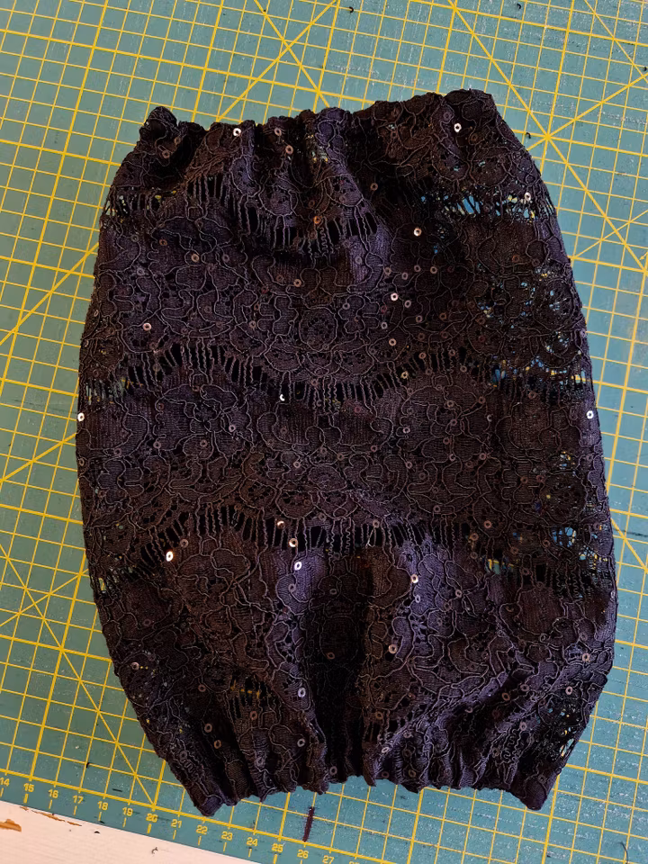 Show sort blondeørehette m/paljetter XS